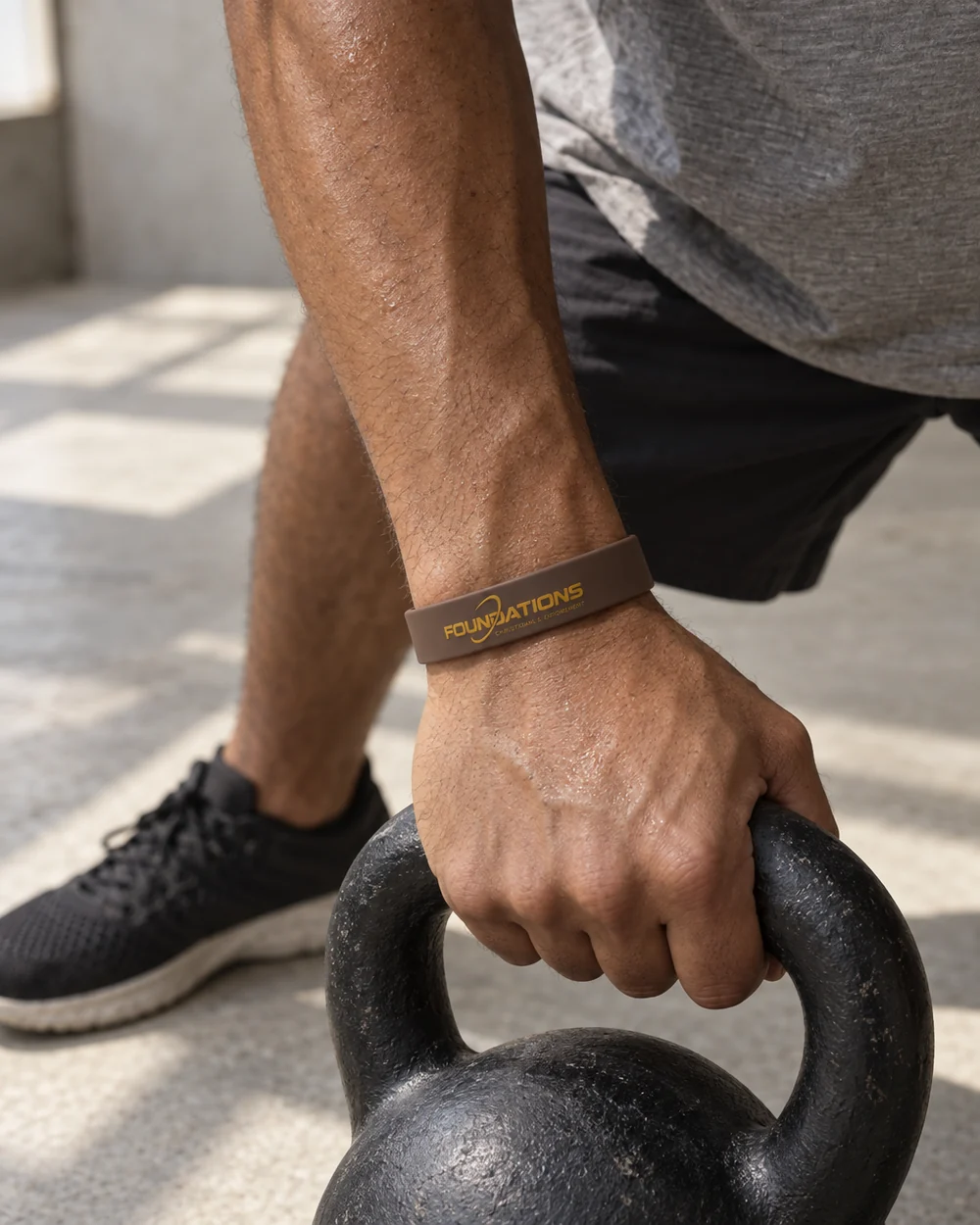 FA Wristband in Oxide, worn by a model