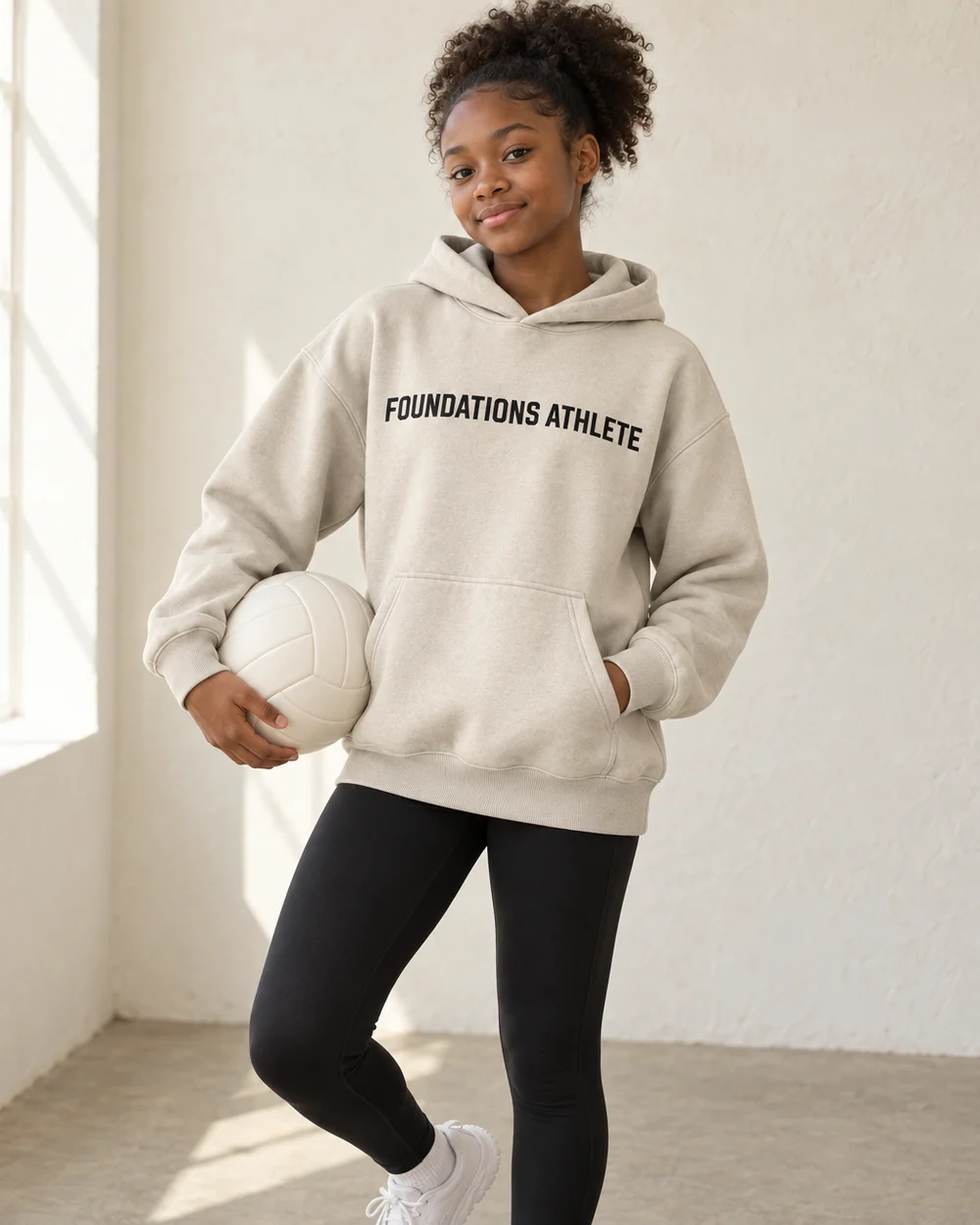 FA Hoodie in Sand, worn by a model